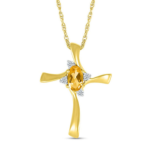 Oval Citrine and Natural Diamond Accent Swirl Ribbon Cross Pendant in 10K Yellow Gold