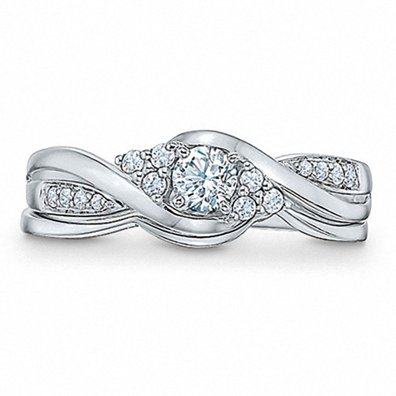 Previously Owned - 0.33 CT. T.W. Natural Diamond Bypass Bridal Engagement Ring Set in Solid 10K White Gold