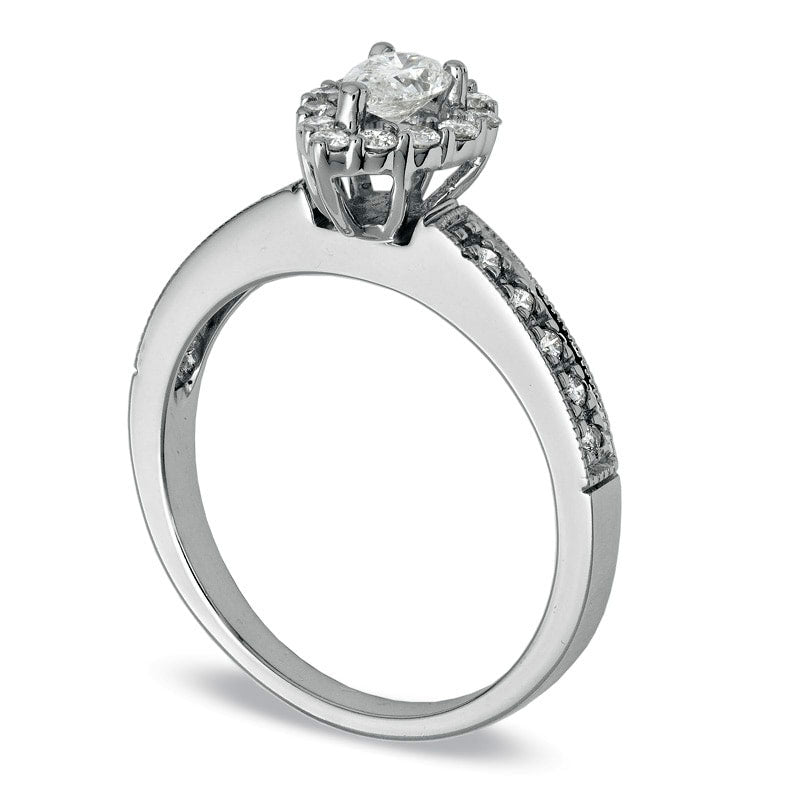 Previously Owned - 0.63 CT. T.W. Pear-Shaped Natural Diamond Frame Engagement Ring in Solid 14K White Gold