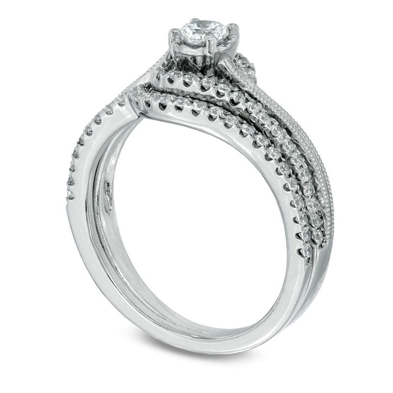 Previously Owned - 0.50 CT. T.W. Natural Diamond Milgrain Swirl Frame Bridal Engagement Ring Set in Solid 10K White Gold