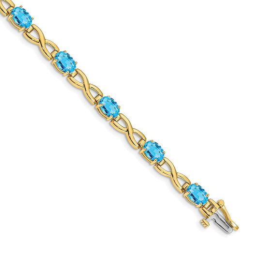 14k Yellow Gold 7x5mm Oval Blue Topaz Bracelet