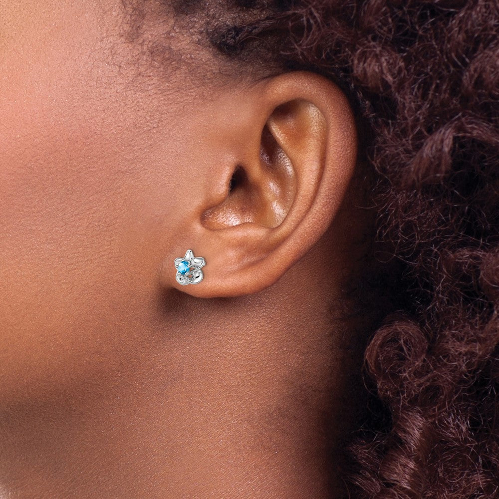 Sterling Silver Rhodium-plated Floral Blue Topaz Post Earrings