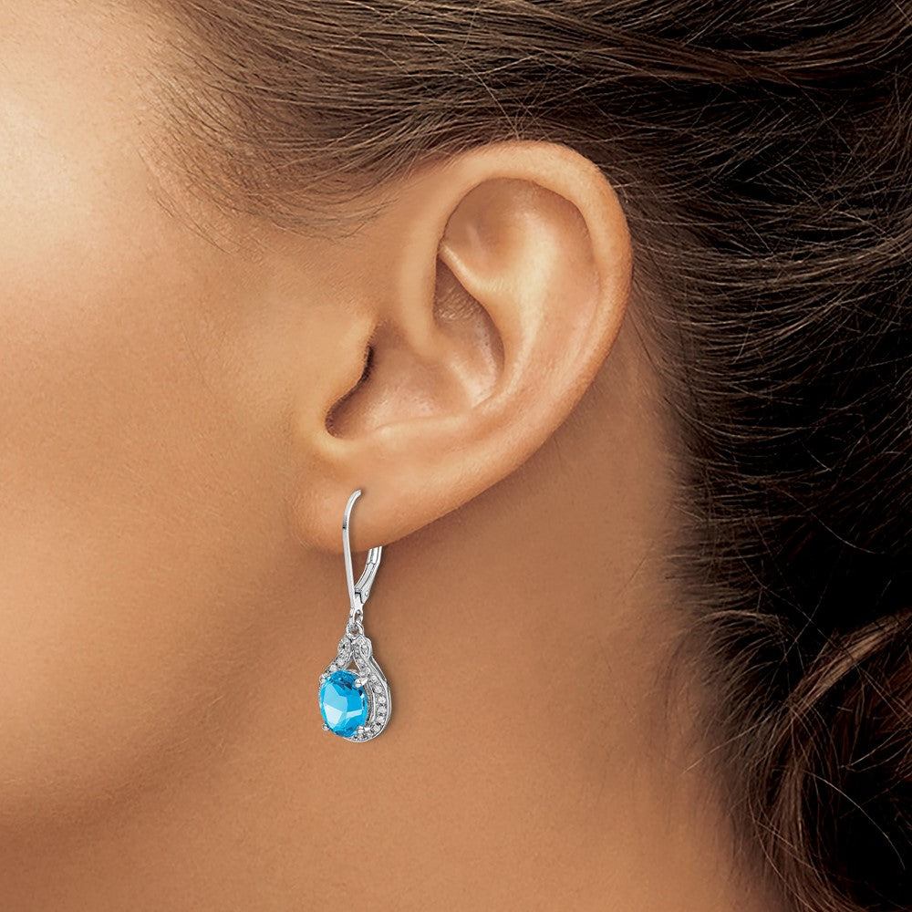 Sterling Silver Rhodium-plated Diamond and Blue Topaz Earrings