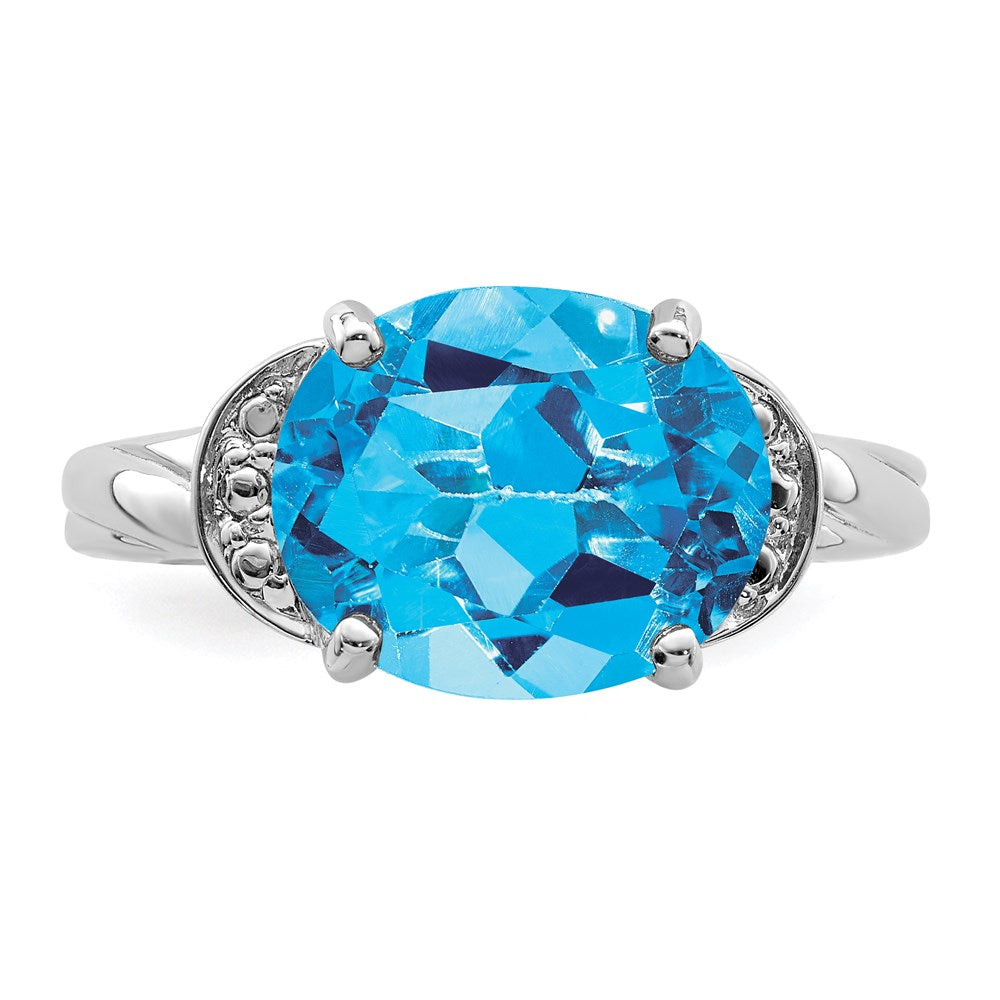 Sterling Silver Rhodium Blue Topaz Ring