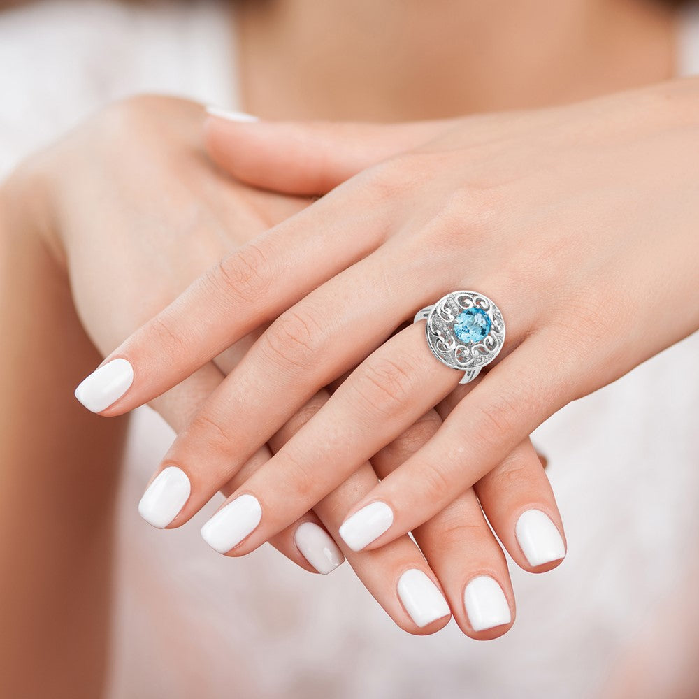 Sterling Silver Rhodium Blue Topaz and Diamond Ring