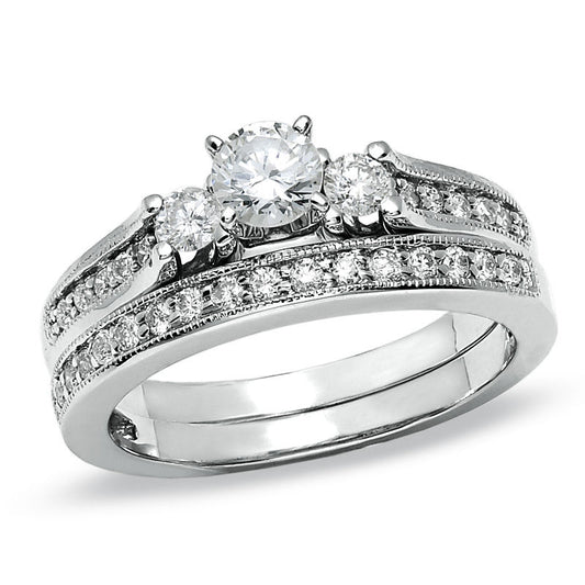 3/4 CT. T.W. Diamond Three Stone Bridal Engagement Ring Set in 14K White Gold