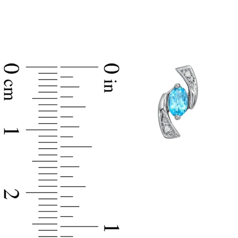 5.0mm Oval Blue Topaz and Diamond Accent Boomerang Earrings in 10K White Gold