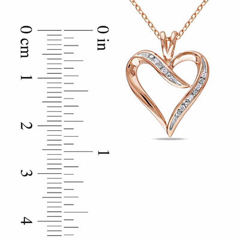 0.05 CT. T.W. Natural Diamond Heart-Shaped Ribbon Pendant in Sterling Silver with Rose Rhodium