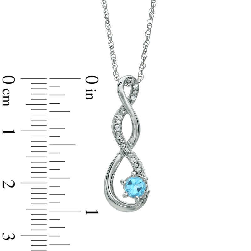 4.5mm Blue Topaz and Natural Diamond Accent Twist Pendant in Sterling Silver