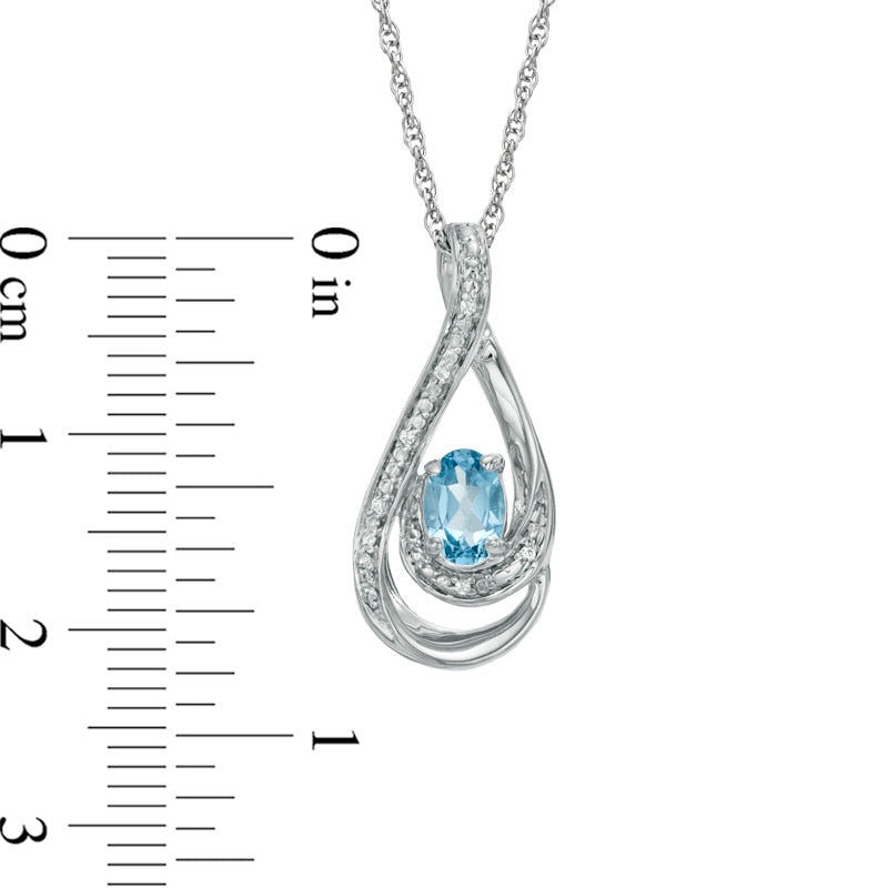 Oval Blue Topaz and Natural Diamond Accent Loop Pendant in Sterling Silver