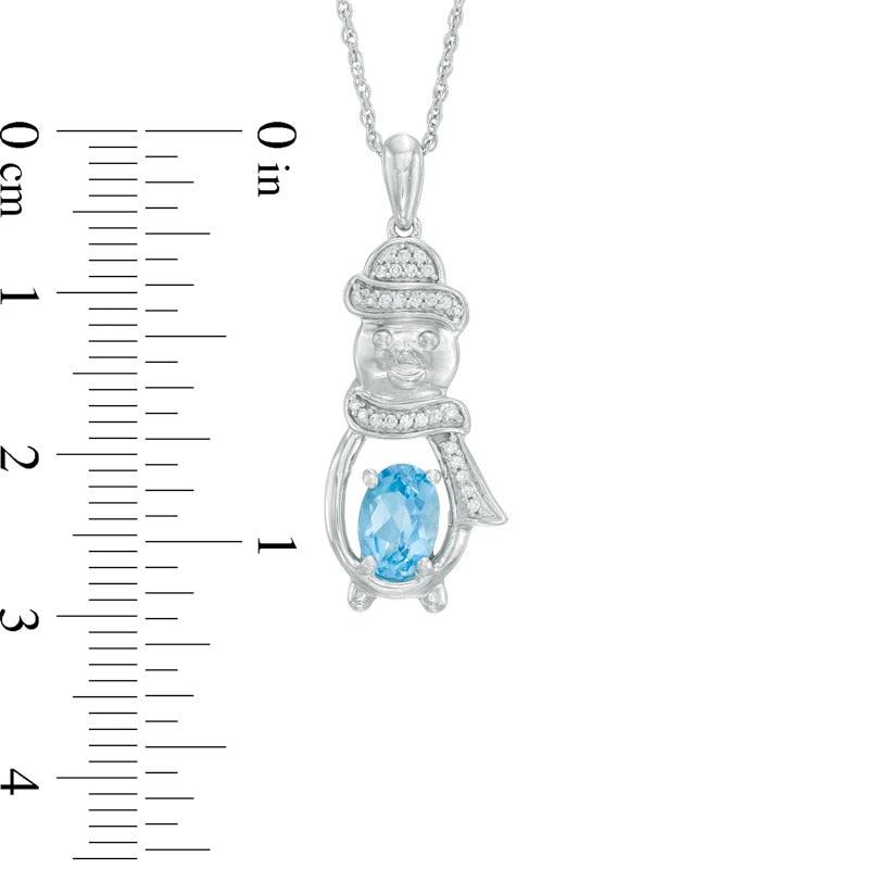 Oval Blue Topaz and Natural Diamond Accent Snowman Pendant in Sterling Silver