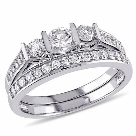 3/4 CT. T.W. Diamond Three Stone Bridal Engagement Ring Set in 14K White Gold