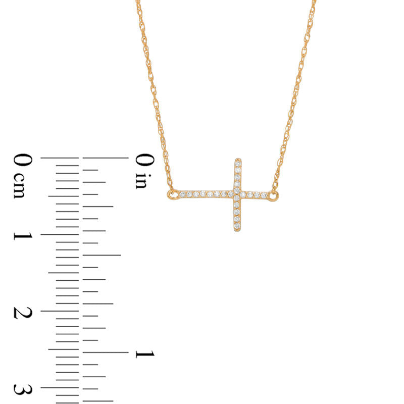 0.05 CT. T.W. Natural Diamond Sideways Cross Necklace in 10K Yellow Gold