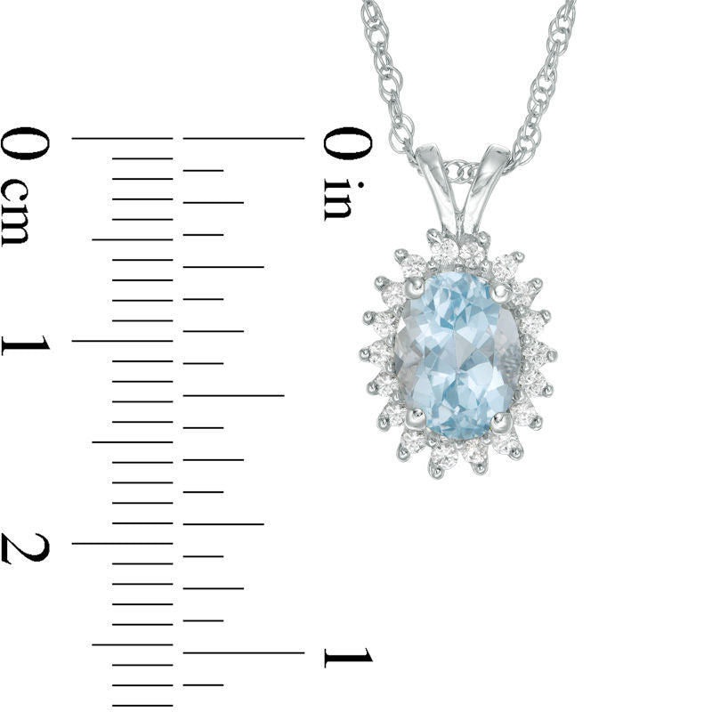 Oval Aquamarine and Lab-Created White Sapphire Starburst Frame Pendant in Sterling Silver