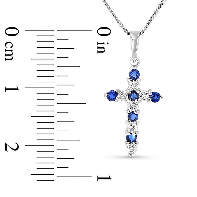 Blue Sapphire and 0.17 CT. T.W. Natural Diamond Alternating Motif Cross Pendant in 14K White Gold