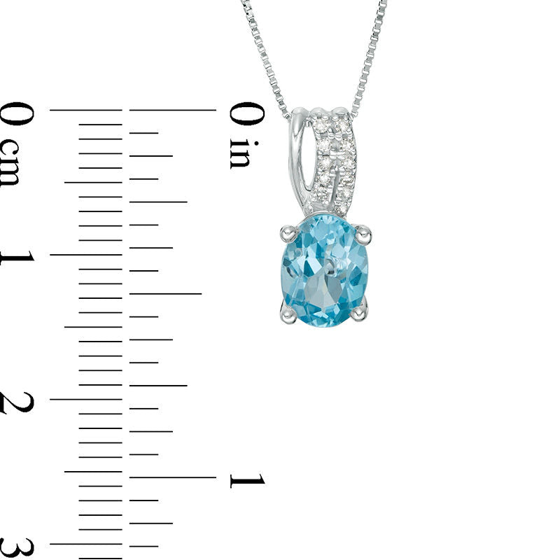 Oval Blue Topaz and Natural Diamond Accent Drop Pendant in 10K White Gold