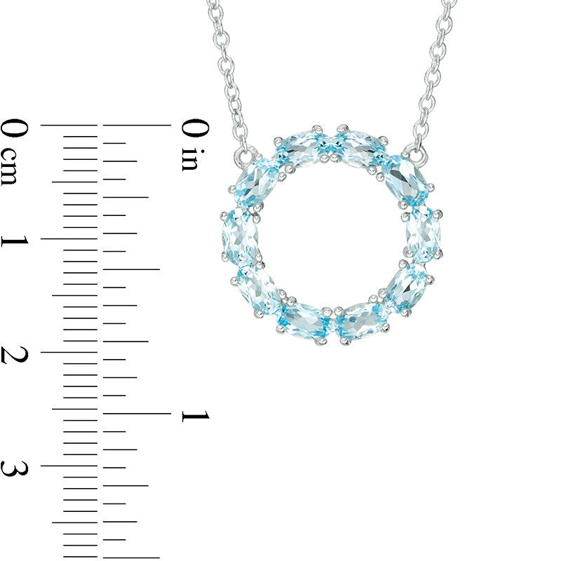 Oval Blue Topaz Circle Necklace in Sterling Silver