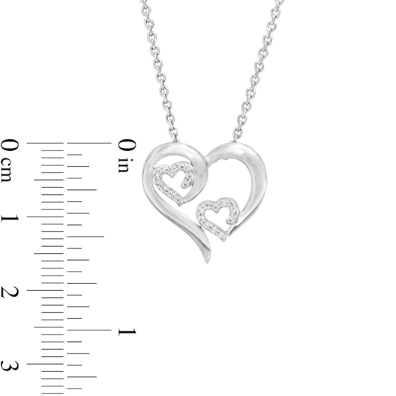 0.1 CT. T.W. Natural Diamond Triple Swirl Heart Pendant in Sterling Silver