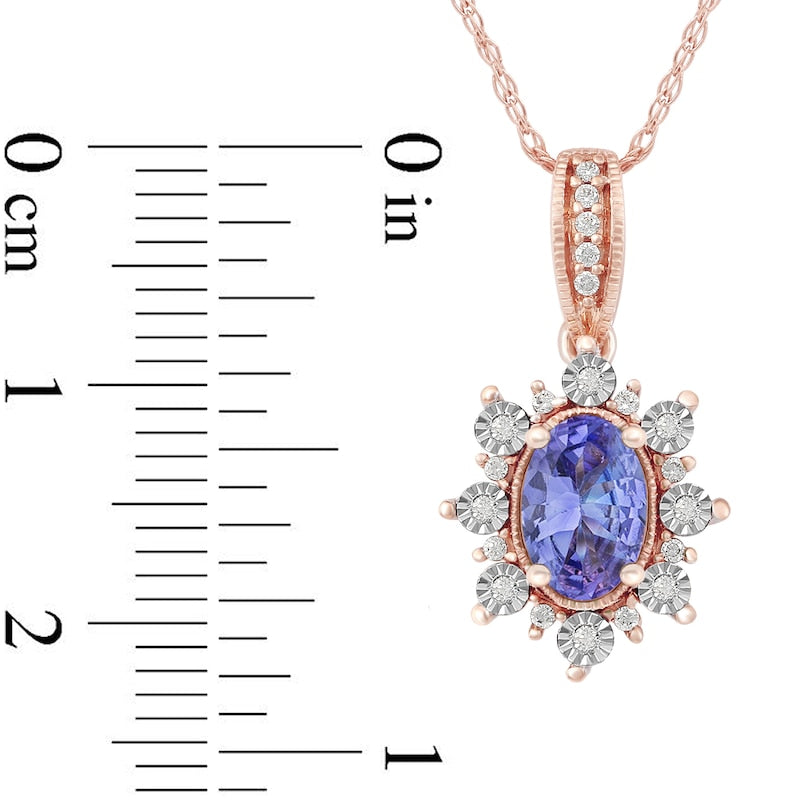 Oval Tanzanite and 0.07 CT. T.W. Natural Diamond Sunburst Frame Antique Vintage-Style Drop Pendant in 10K Rose Gold