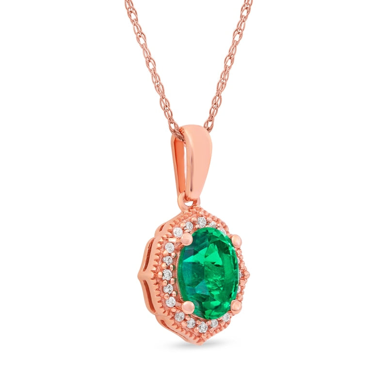 Oval Emerald and 0.05 CT. T.W. Natural Diamond Quatrefoil Frame Antique Vintage-Style Pendant in 10K Rose Gold