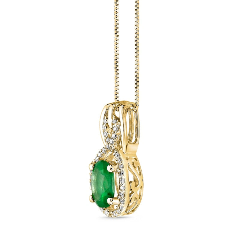 Oval Emerald and 0.1 CT. T.W. Natural Diamond Infinity Drop Pendant in 10K Yellow Gold