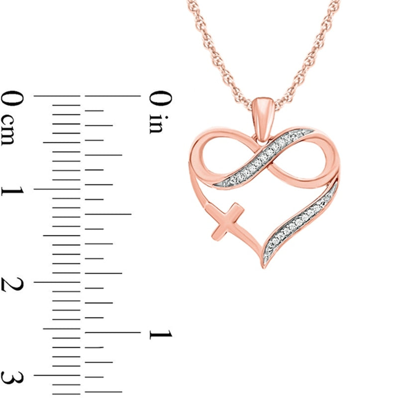 0.05 CT. T.W. Natural Diamond Infinity Cross Heart Pendant in 10K Rose Gold