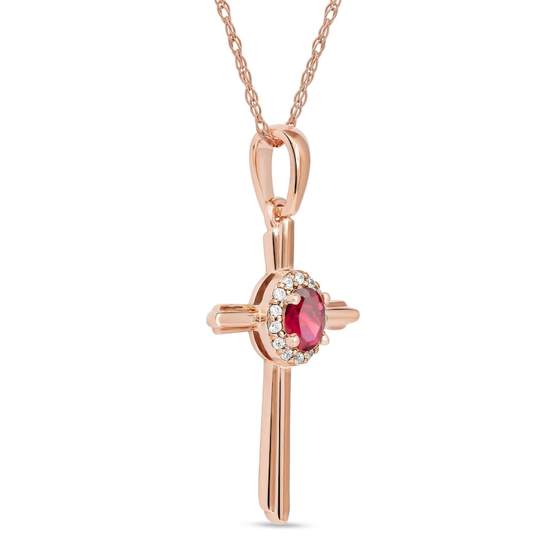 Oval Ruby and 0.05 CT. T.W. Natural Diamond Frame Layered Cross Pendant in 10K Rose Gold