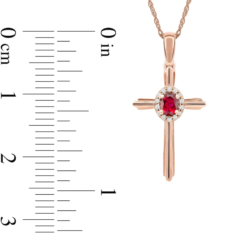 Oval Ruby and 0.05 CT. T.W. Natural Diamond Frame Layered Cross Pendant in 10K Rose Gold