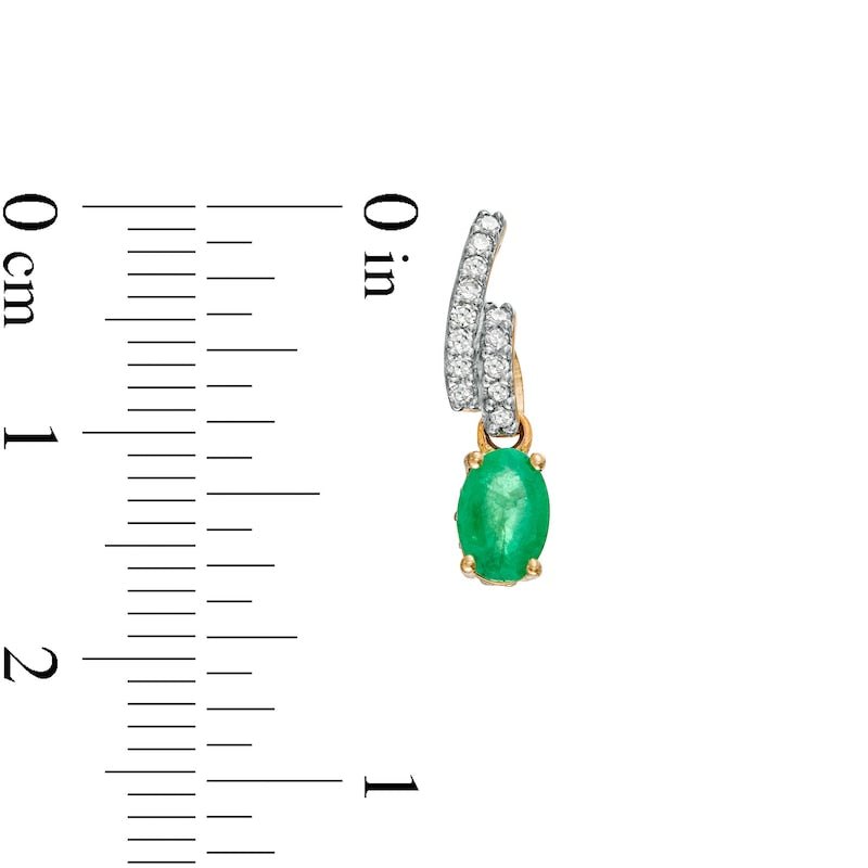 Oval Emerald and 0.17 CT. T.W. Diamond Bypass Ribbon Loop Drop Earrings in 10K Gold