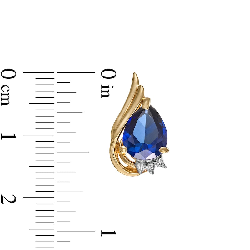 Pear-Shaped Blue Lab-Created Sapphire and 0.05 CT. T.W. Diamond Flame Stud Earrings in 10K Gold